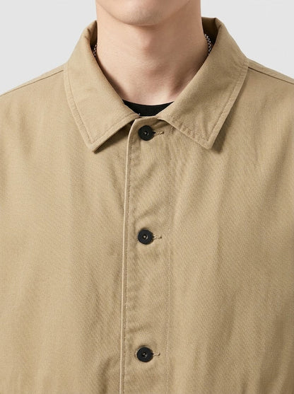Close-up of Serovine lapel collar and fabric detail